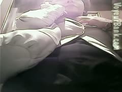 A hidden webcam in the public women's restroom captures a glimpse of